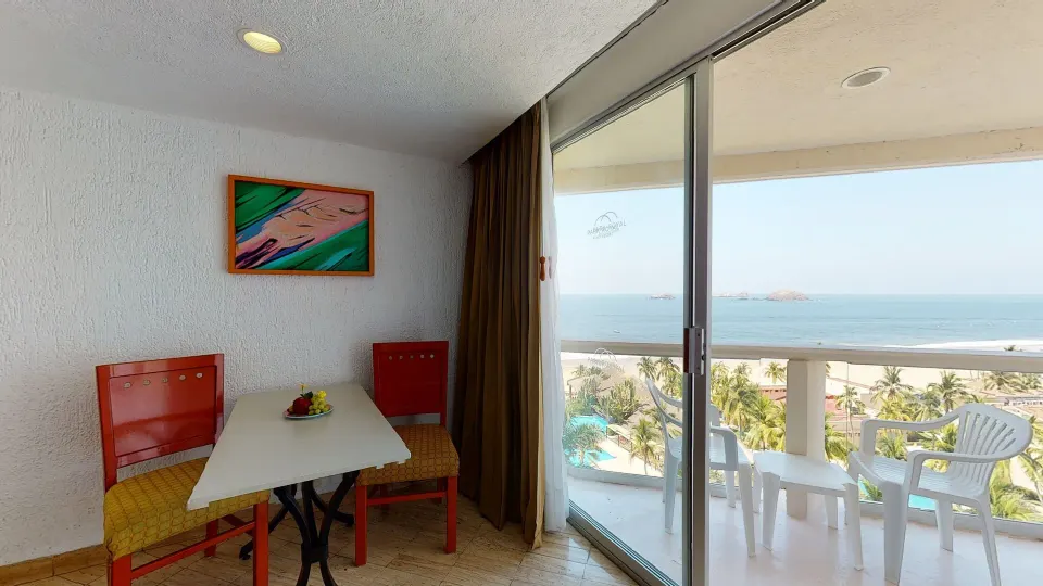 Premier Ocean View sitting area and balcony at Park Royal Beach Ixtapa.