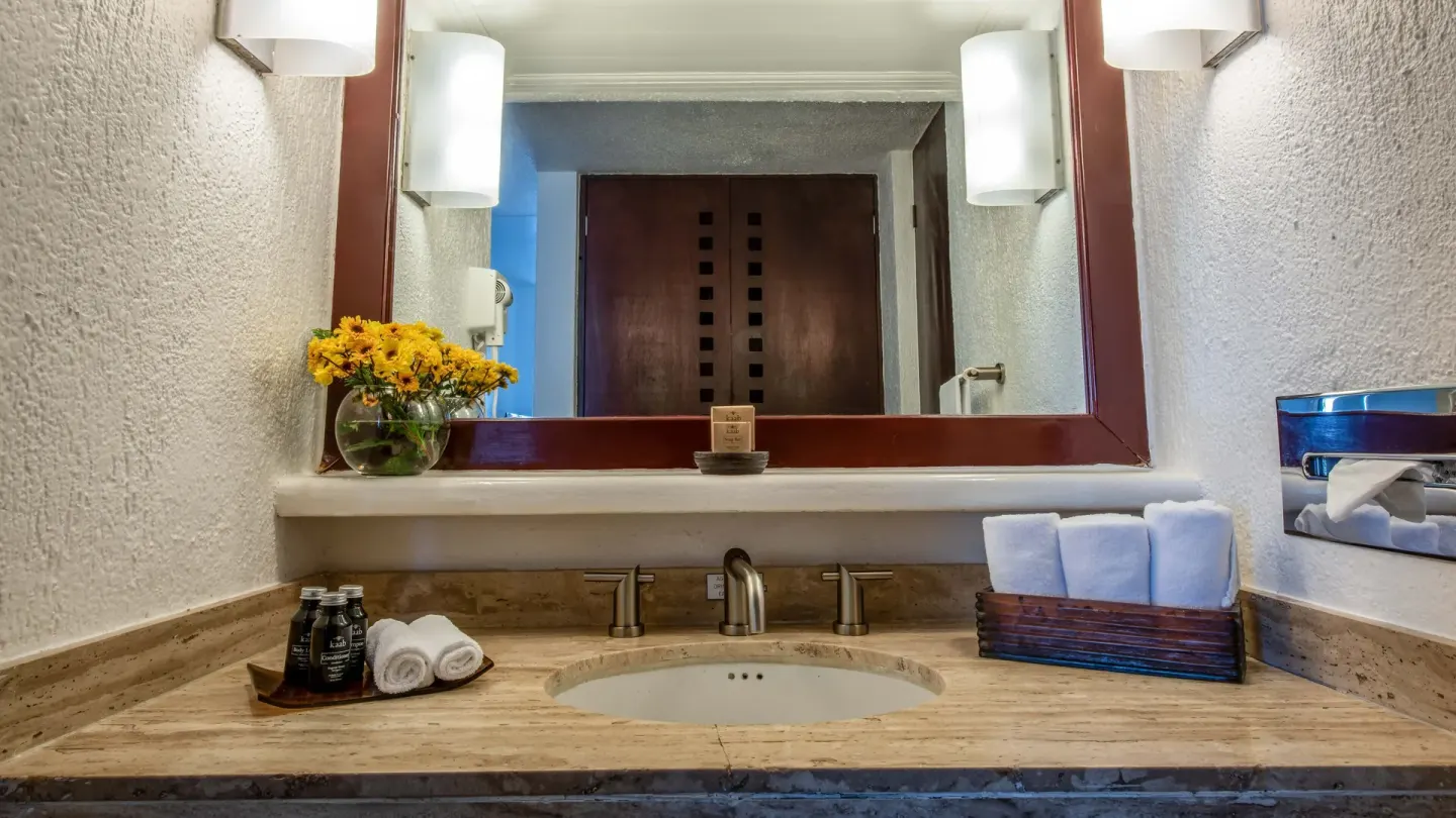 Premier Room Ocean View bathroom vanity with mirror at Park Royal Beach Ixtapa.