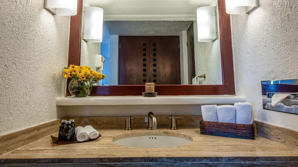 Premier Room Ocean View bathroom vanity with mirror at Park Royal Beach Ixtapa.