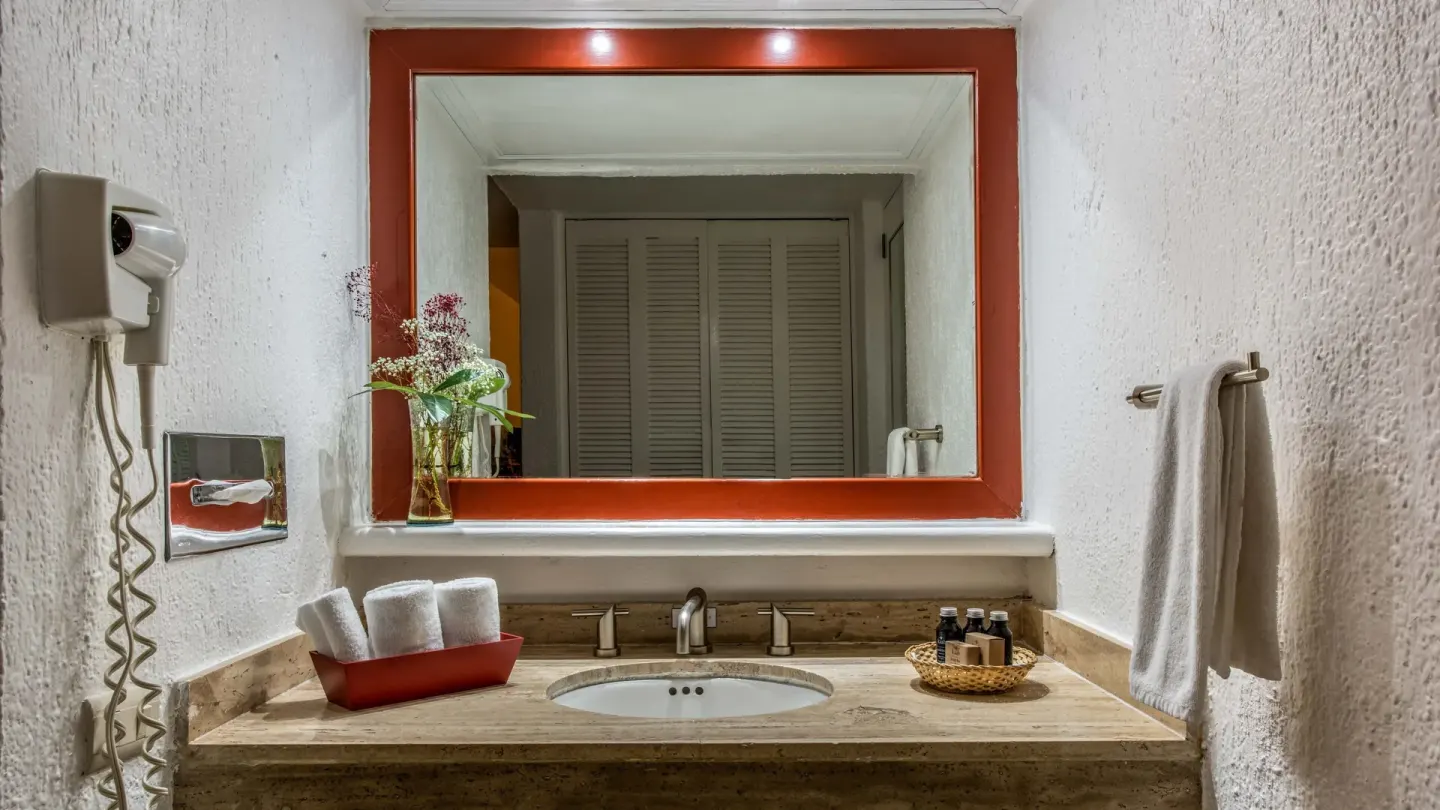 Premier Room Ocean View bathroom vanity with towel rail at Park Royal Beach Ixtapa.