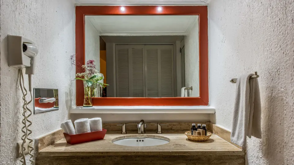 Premier Room Ocean View bathroom vanity with towel rail at Park Royal Beach Ixtapa.