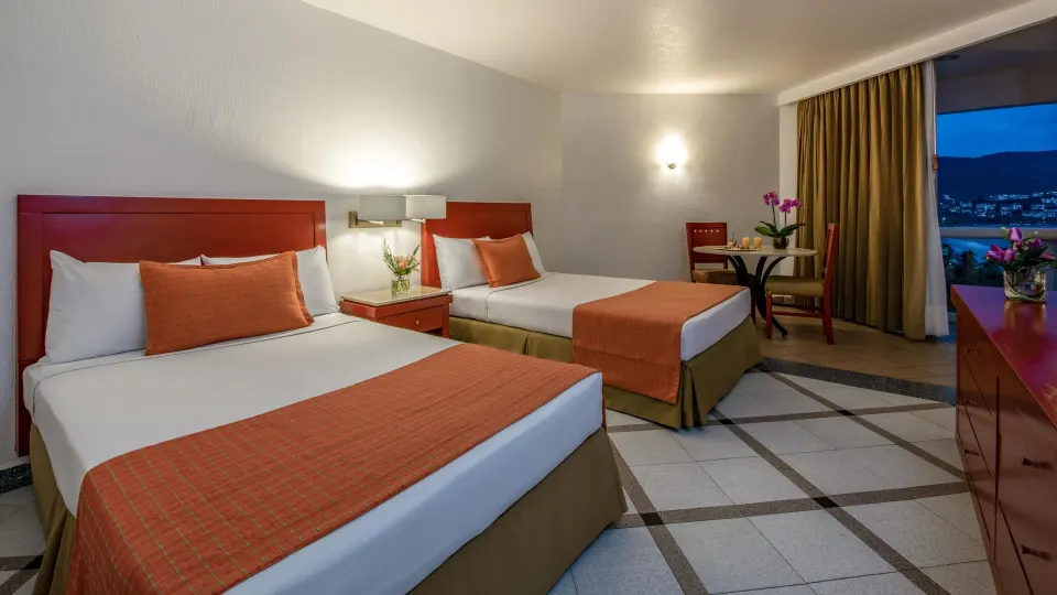 Premier Room Ocean View with two beds and balcony at Park Royal Beach Ixtapa.