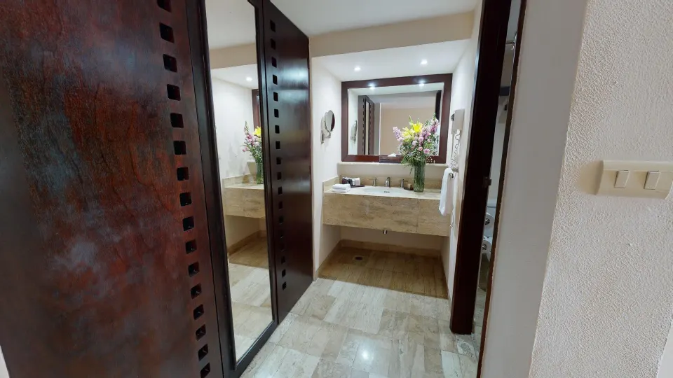Royal Ocean View bathroom vanity and mirror at Park Royal Beach Ixtapa.