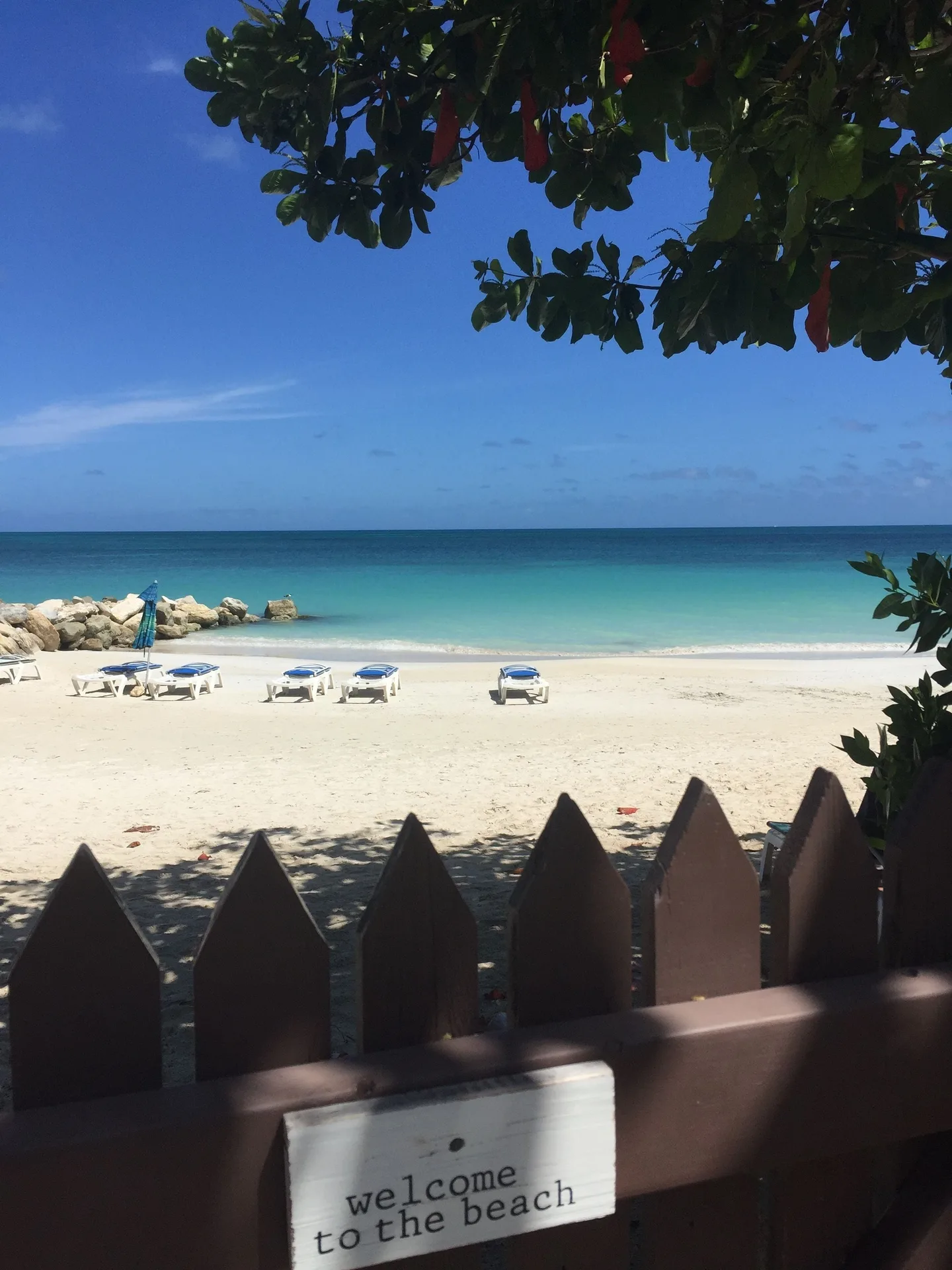 Buccaneer Beach Club beachfront apartment hotel with tropical gardens and Dickenson Bay access