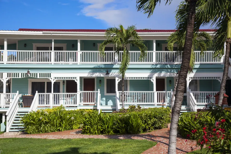Two-story guest room building and gardens at Pineapple Beach Club Antigua.
