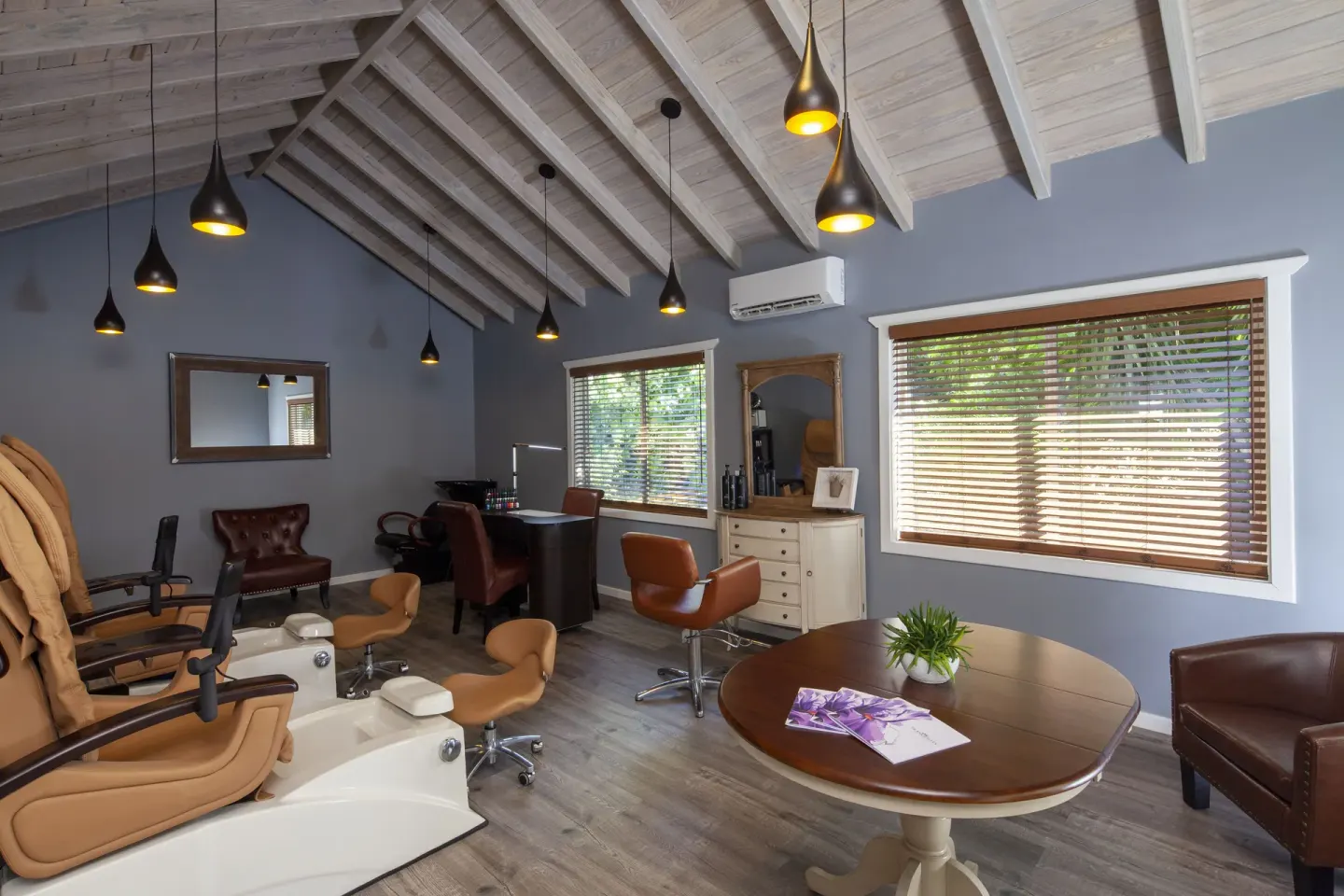 Spa salon room with pedicure chairs and styling stations at Pineapple Beach Club Antigua.