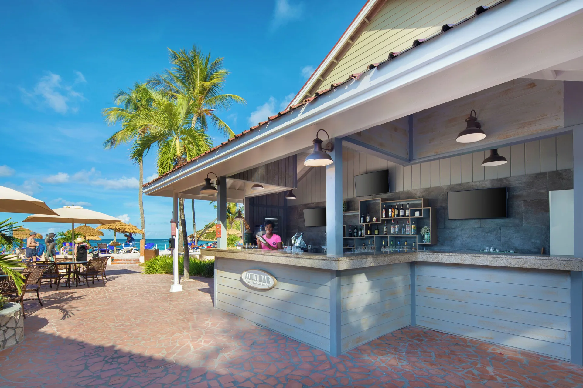 Aqua Bar counter by the pool and beach at Pineapple Beach Club Antigua.