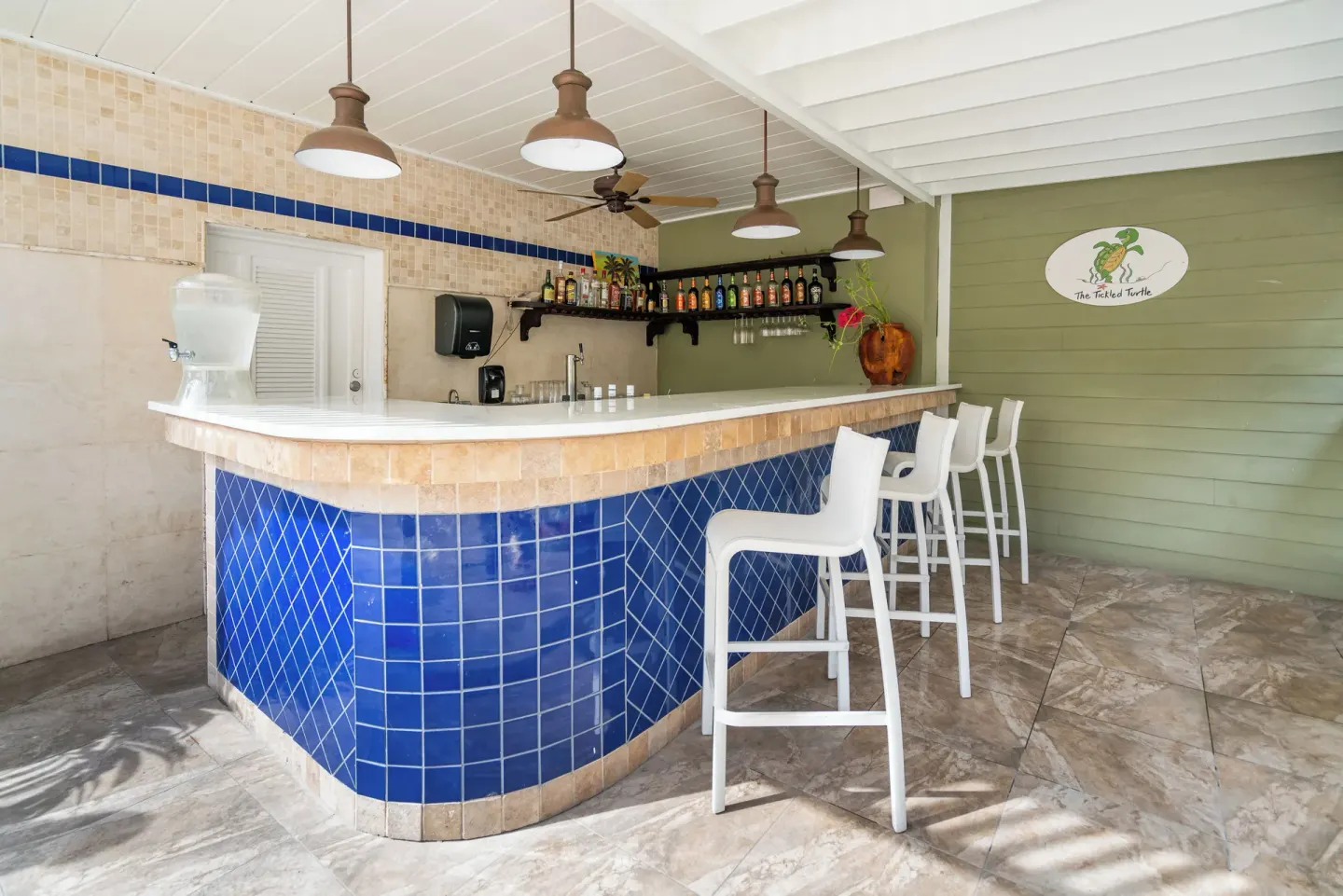 Tickled Turtle Bar with blue tile counter at Pineapple Beach Club Antigua.