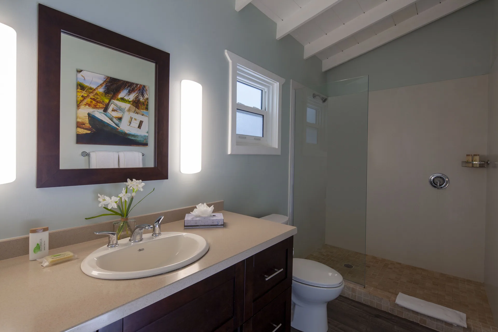 Gardenview Room bathroom vanity and walk-in shower at Pineapple Beach Club Antigua.