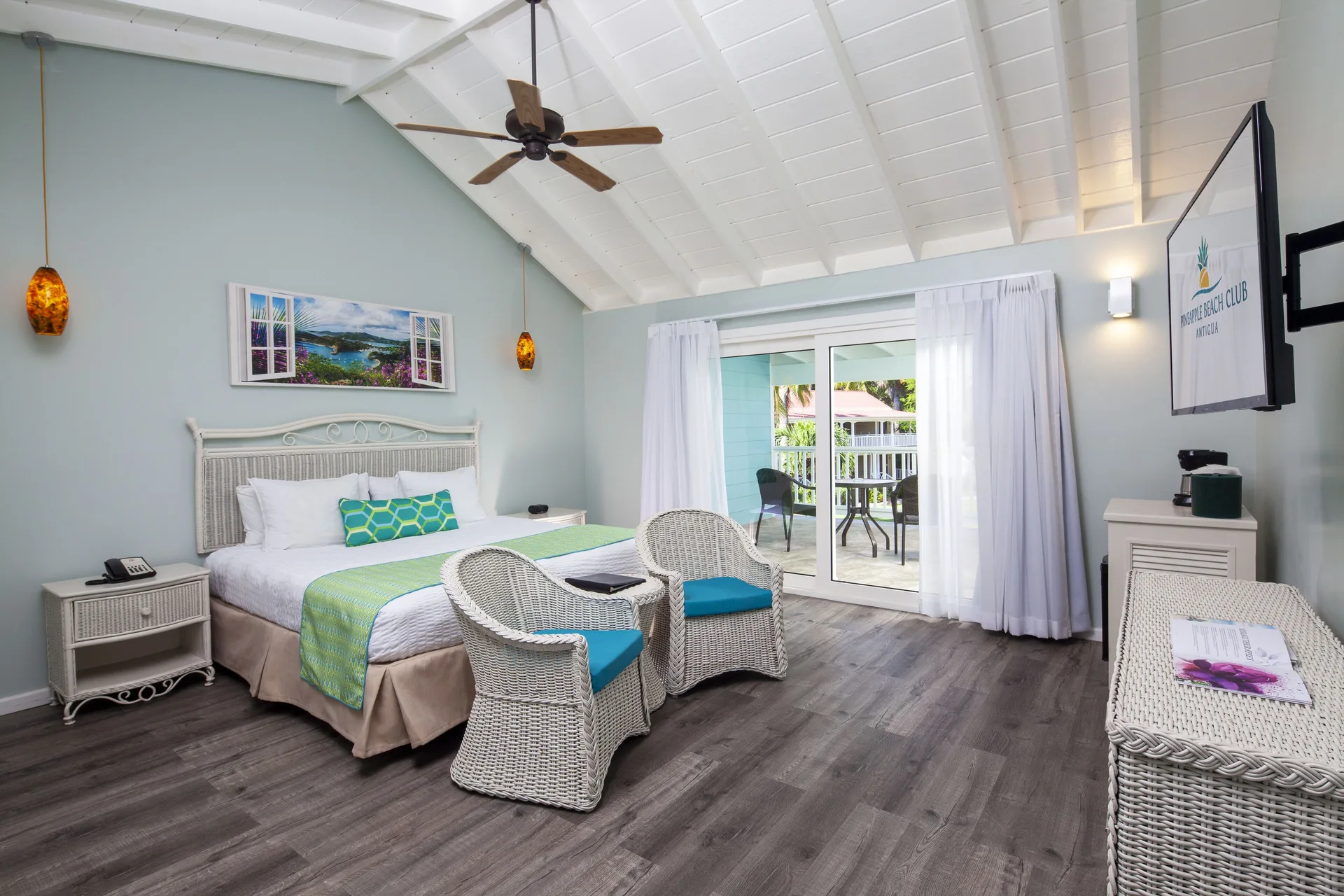 Gardenview Room with king bed and balcony seating at Pineapple Beach Club Antigua.