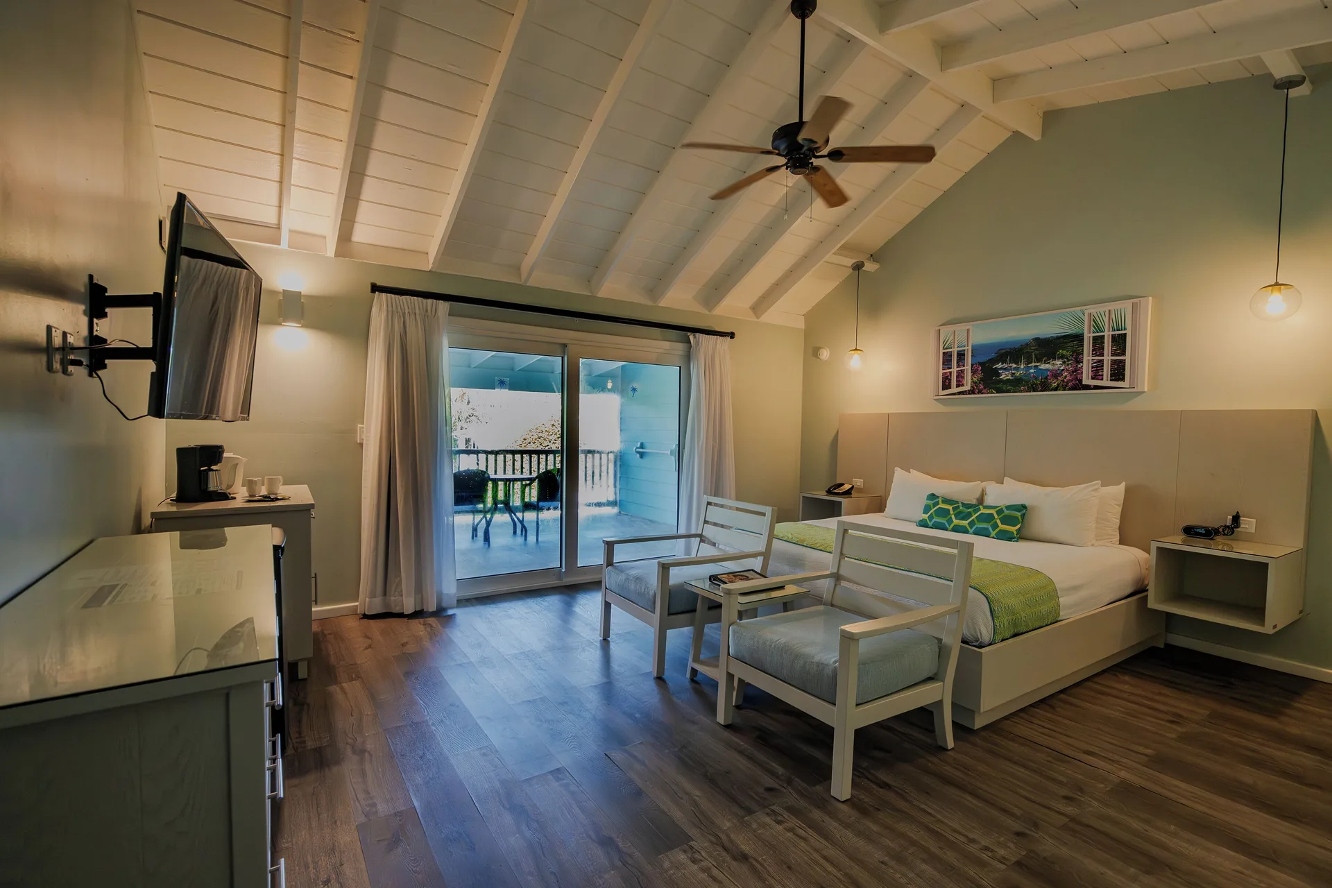 Gardenview Room with king bed and patio doors at Pineapple Beach Club Antigua.