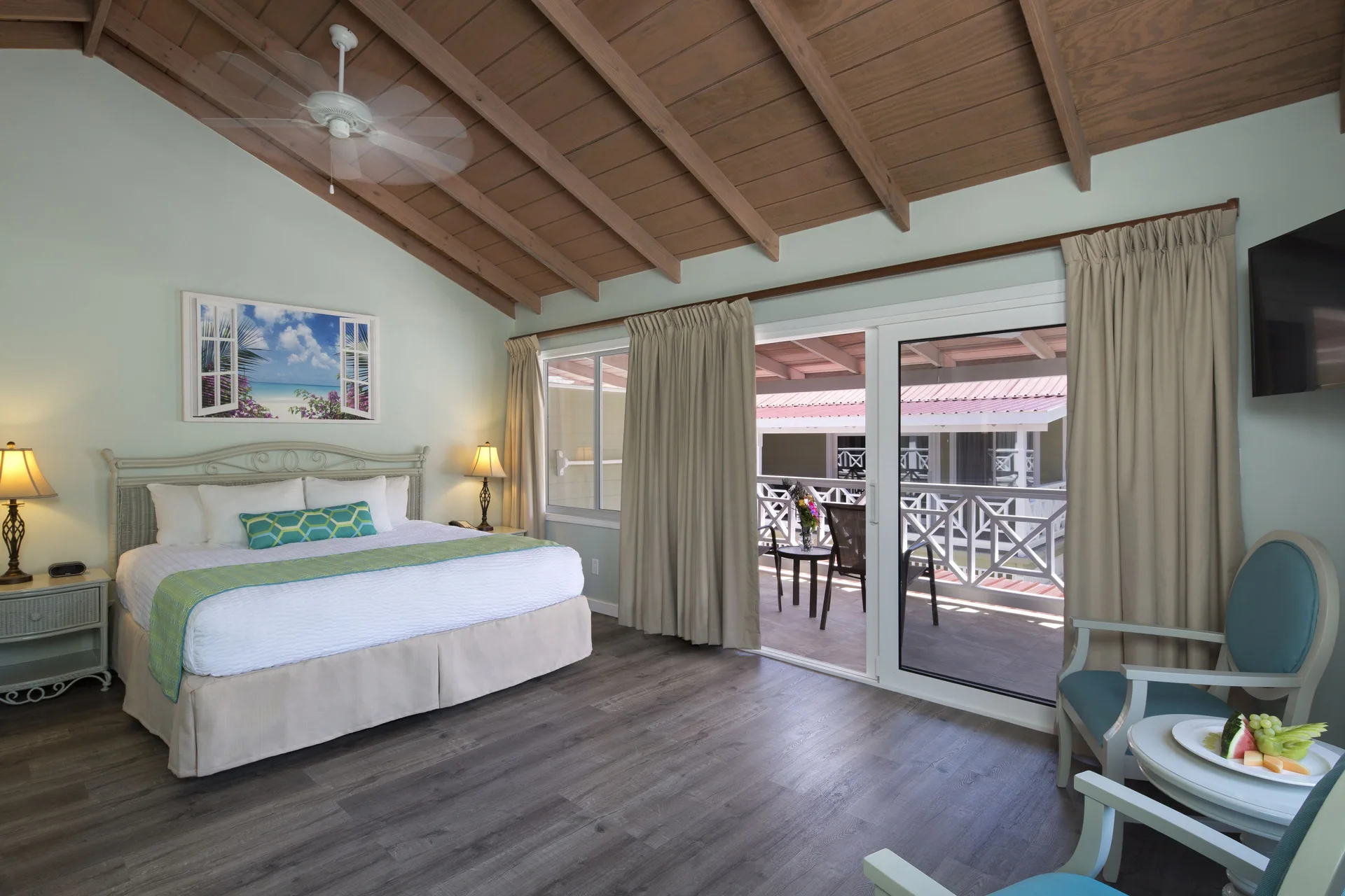 Pool Terrace king room with balcony seating at Pineapple Beach Club Antigua.