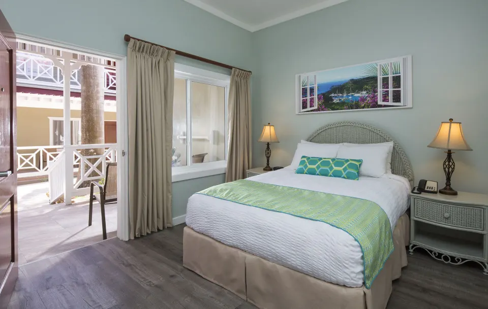 Pool Terrace queen room with patio doorway at Pineapple Beach Club Antigua.