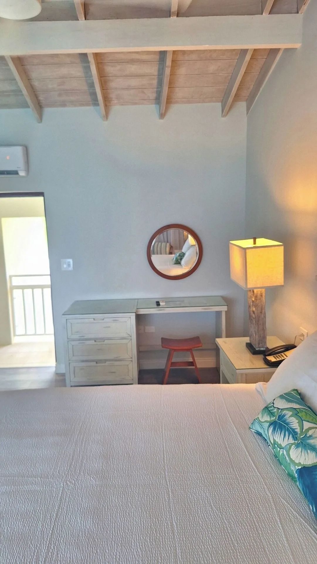 Waterfront room desk and bed detail at Pineapple Beach Club Antigua.