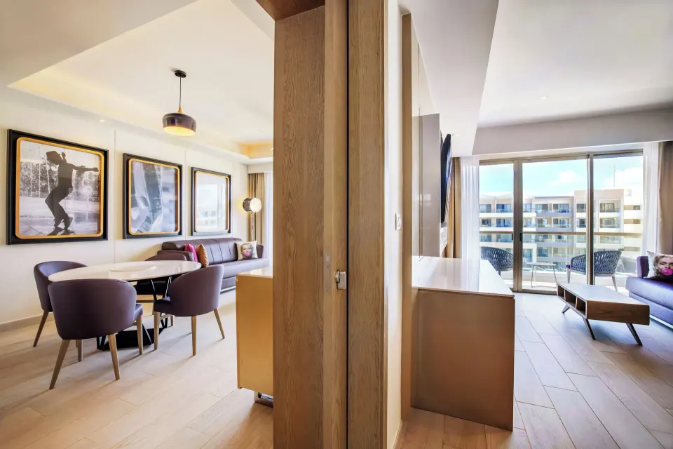 Directors Suite One Bedroom living and bedroom areas at Planet Hollywood Cancun.