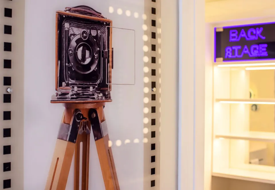 Junior Suite wall art with vintage camera image at Planet Hollywood Cancun.