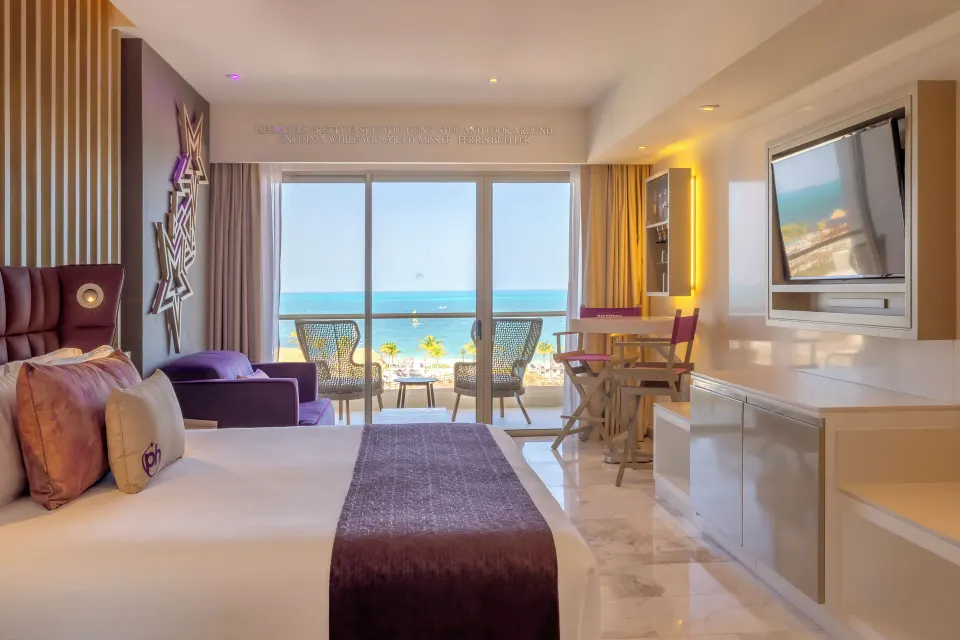 Star Class Producers Two Bedrooms Suite bedroom with ocean view at Planet Hollywood Cancun.