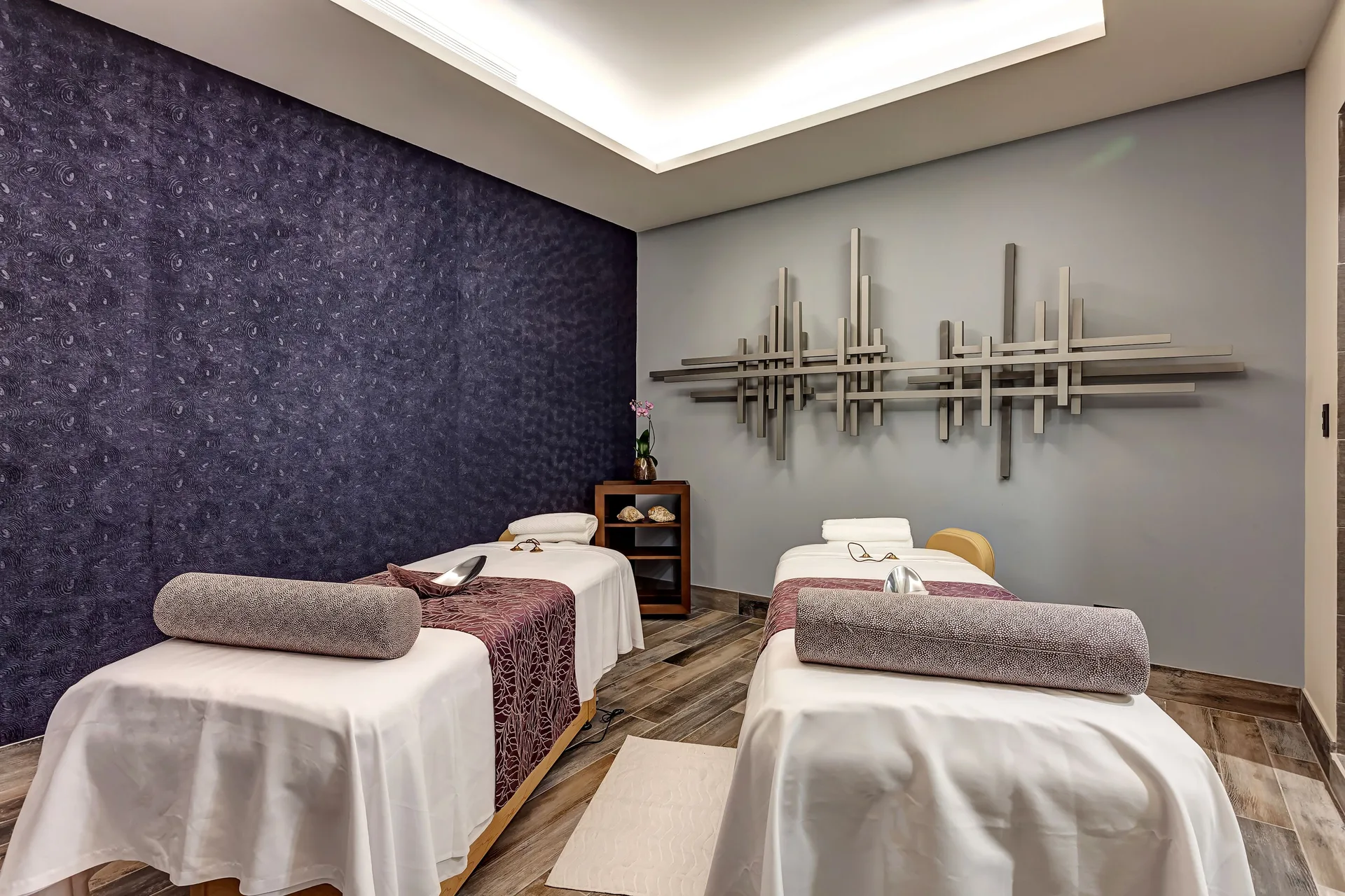 Couples spa treatment room with two massage tables at Planet Hollywood Costa Rica.