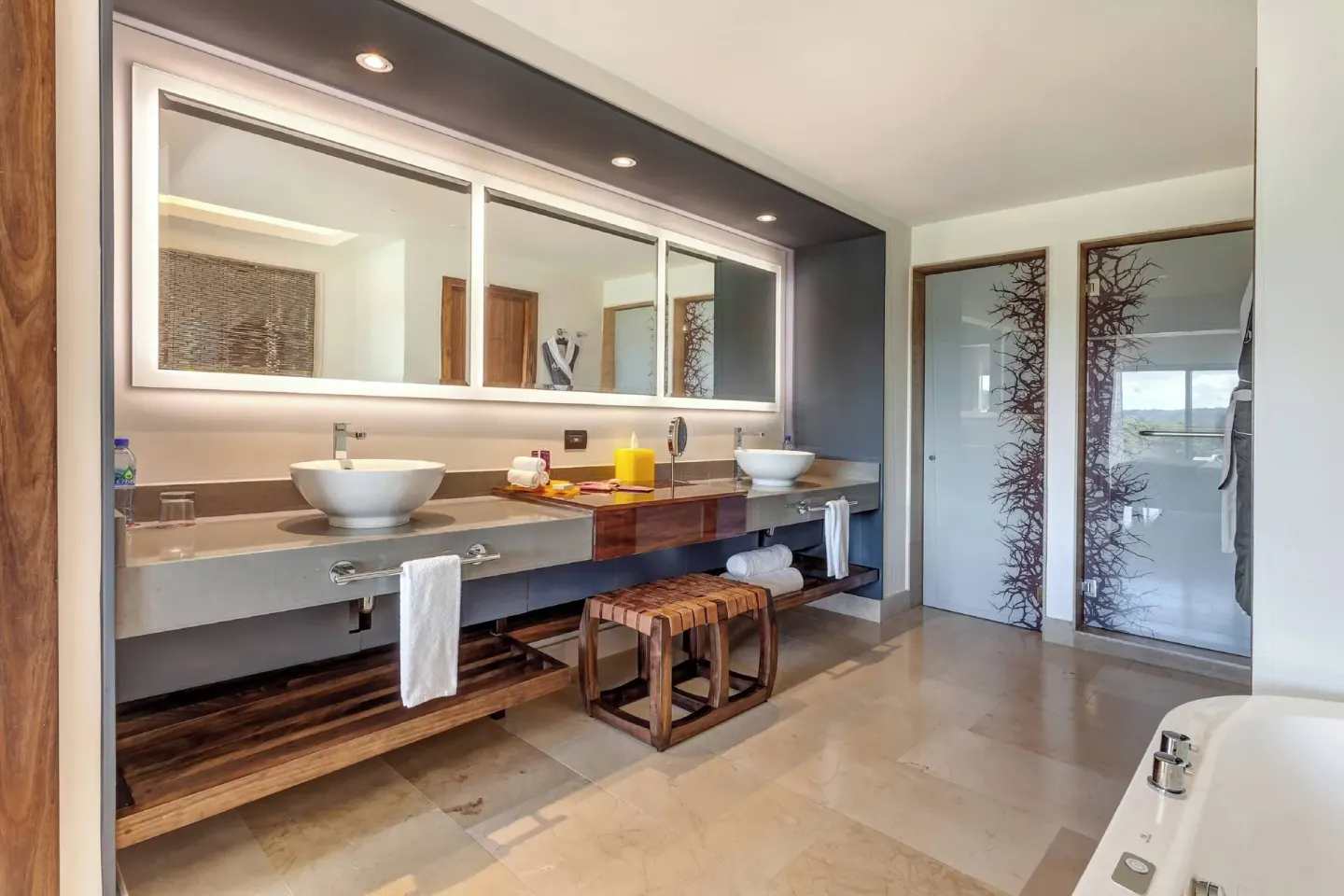 Guest room bathroom with double sinks at Planet Hollywood Costa Rica.