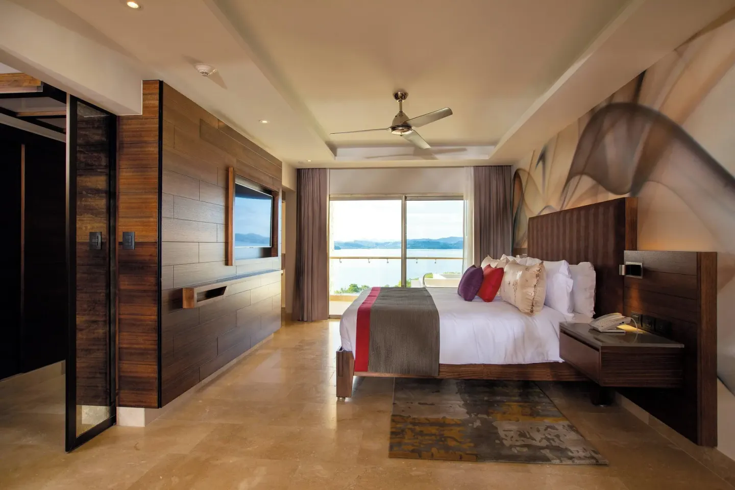 King bed guest room with ocean view at Planet Hollywood Costa Rica.