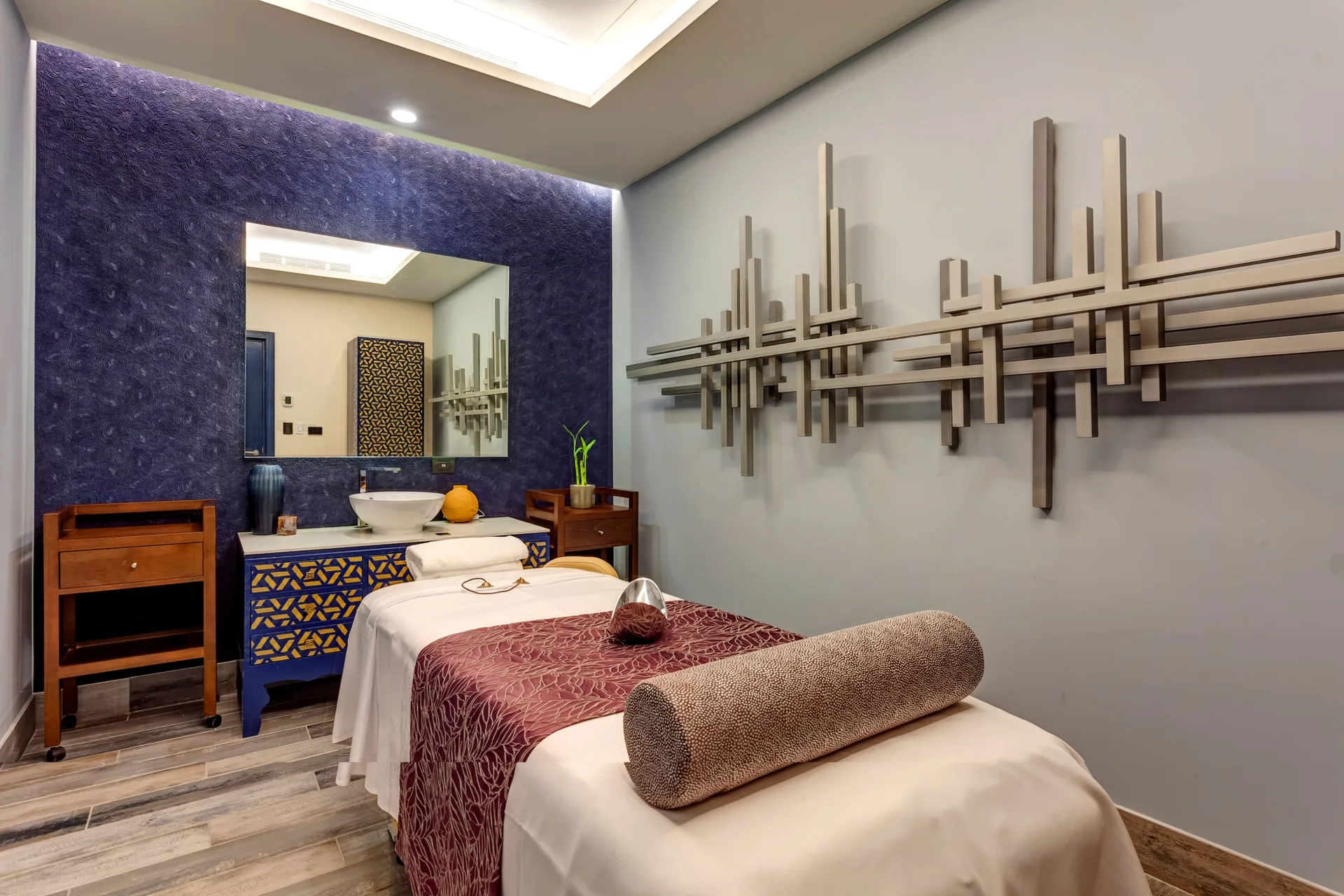 Spa treatment room with a single massage table at Planet Hollywood Costa Rica.