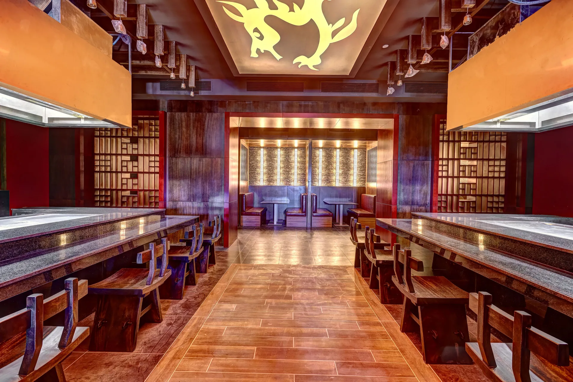 Teppanyaki-style counter seating inside a restaurant at Planet Hollywood Costa Rica.