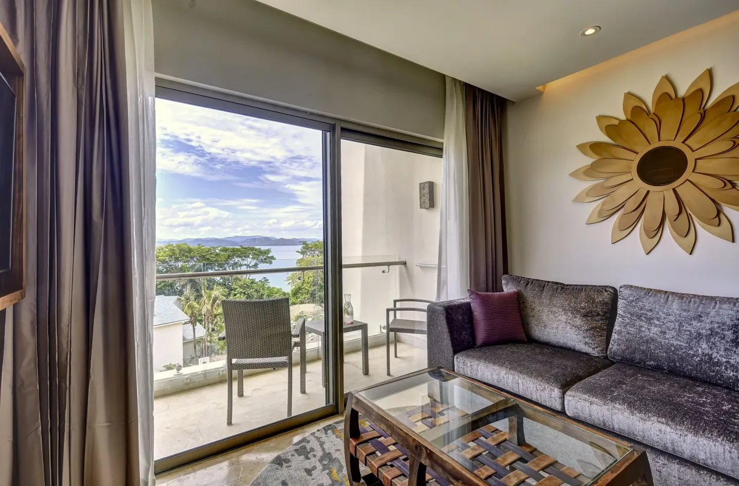 Junior Suite Ocean View sitting area and balcony at Planet Hollywood Costa Rica.
