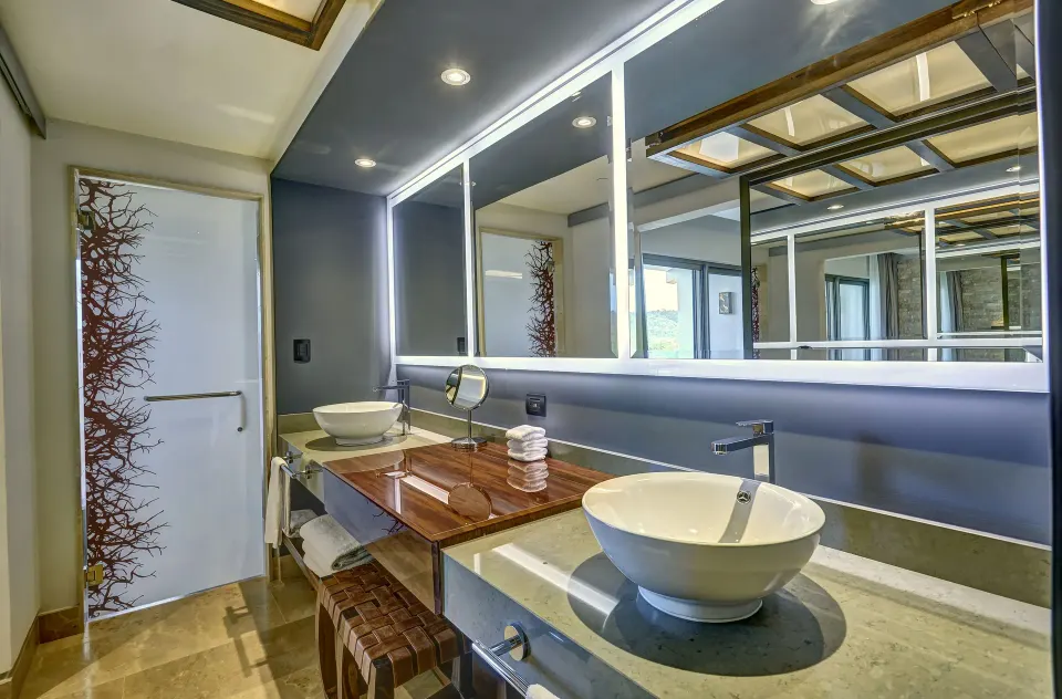 Junior Suite bathroom vanity and illuminated mirror at Planet Hollywood Costa Rica.