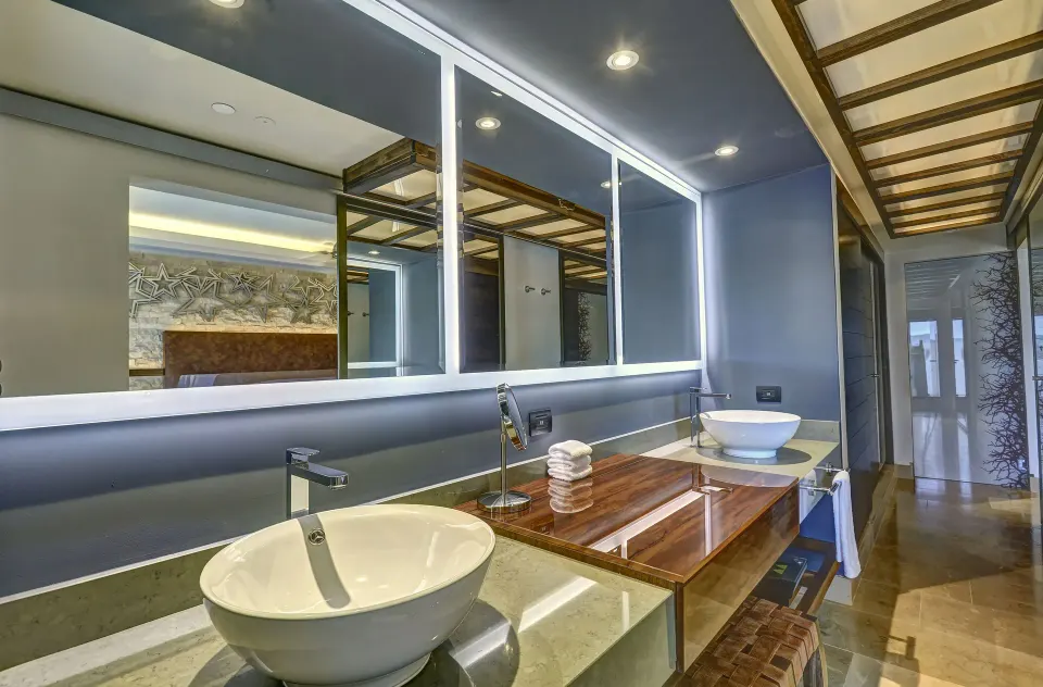 Junior Suite bathroom with double vessel sinks at Planet Hollywood Costa Rica.