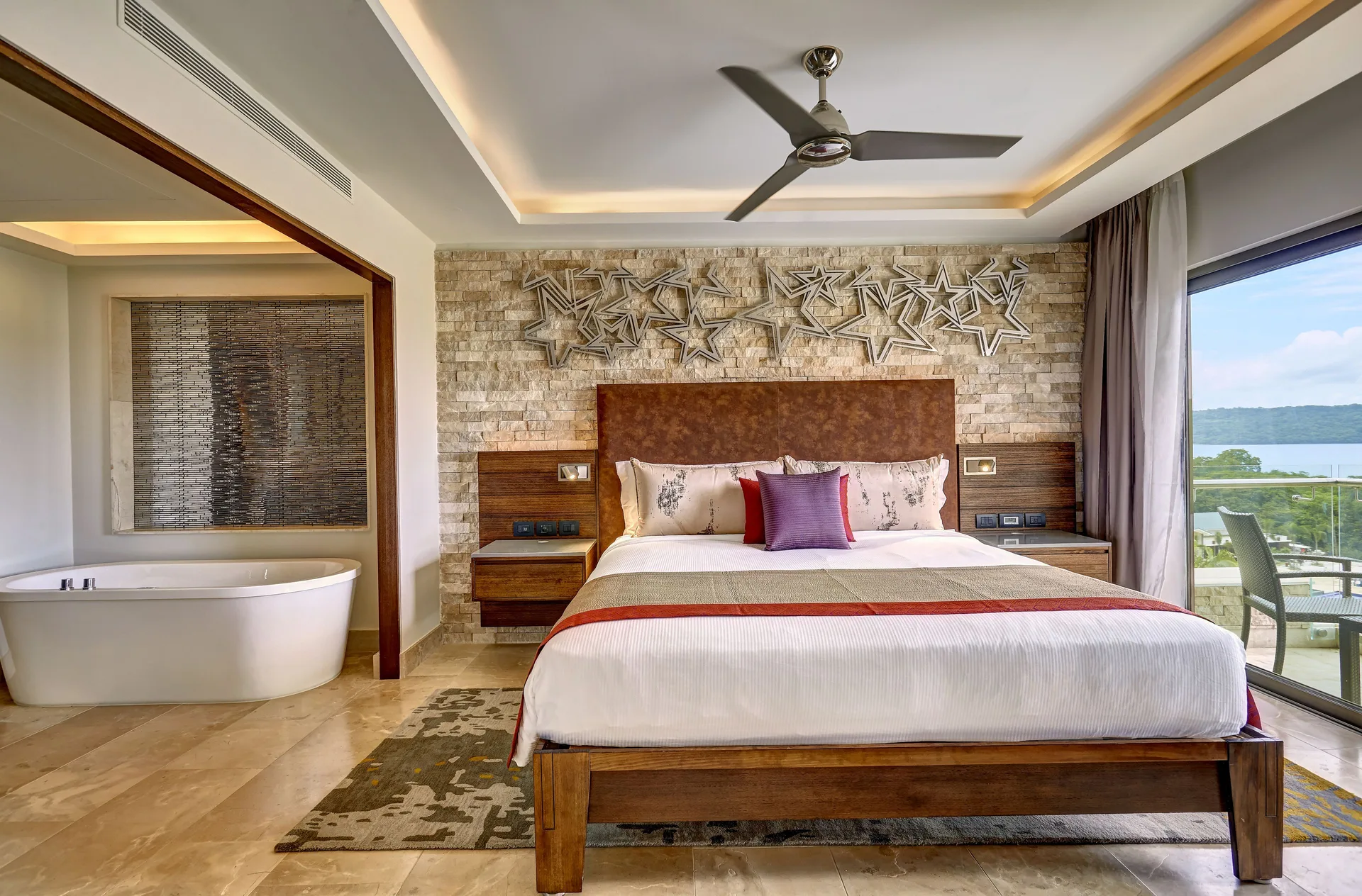 Star Class Director's Suite king bed and soaking tub at Planet Hollywood Costa Rica.