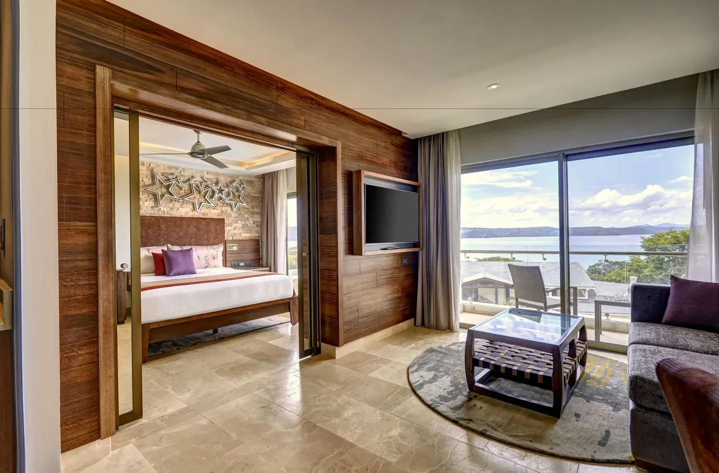 Star Class Director's Suite living room and king bedroom at Planet Hollywood Costa Rica.
