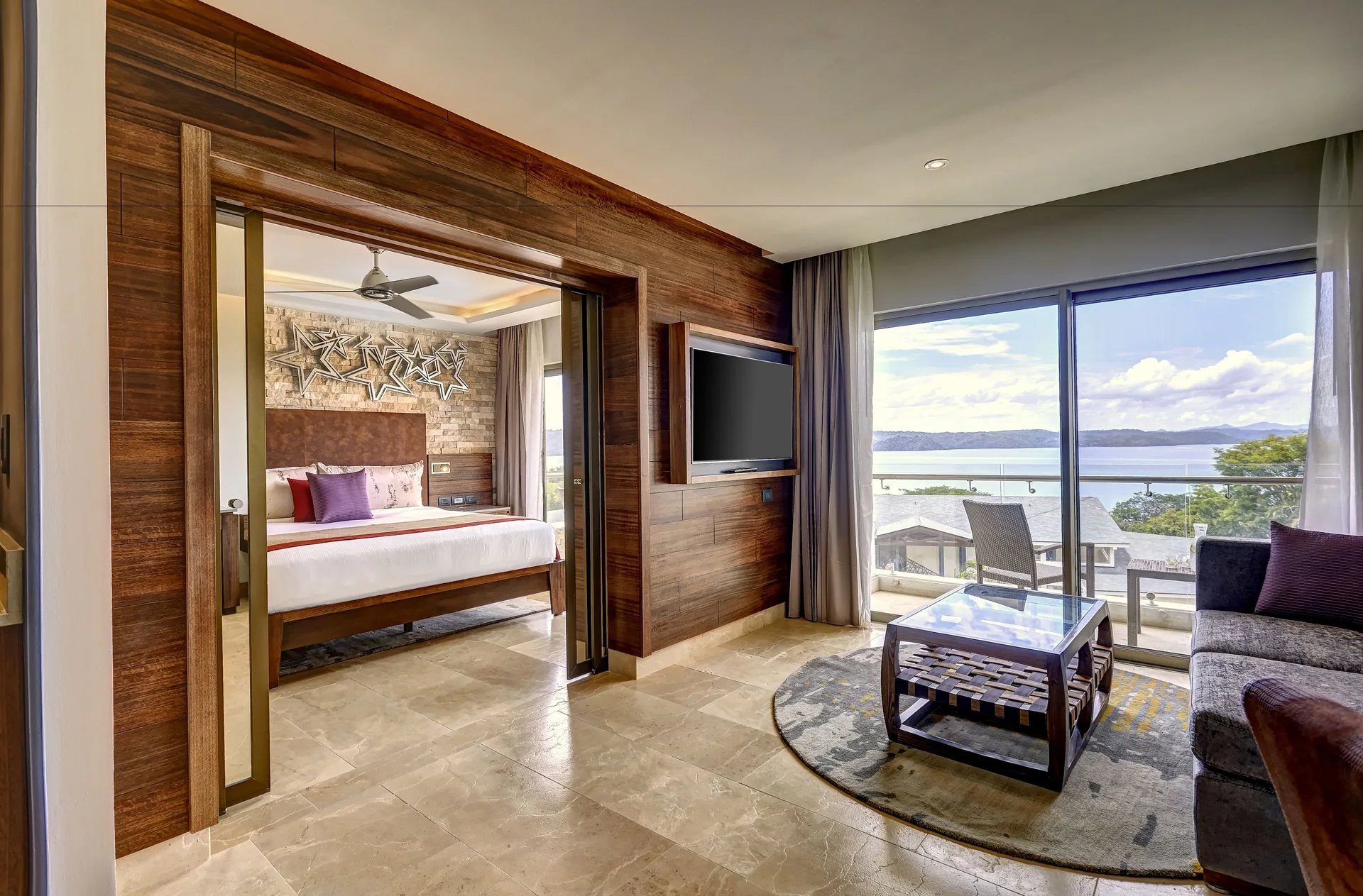 Star Class Director's Suite living room and king bedroom at Planet Hollywood Costa Rica.
