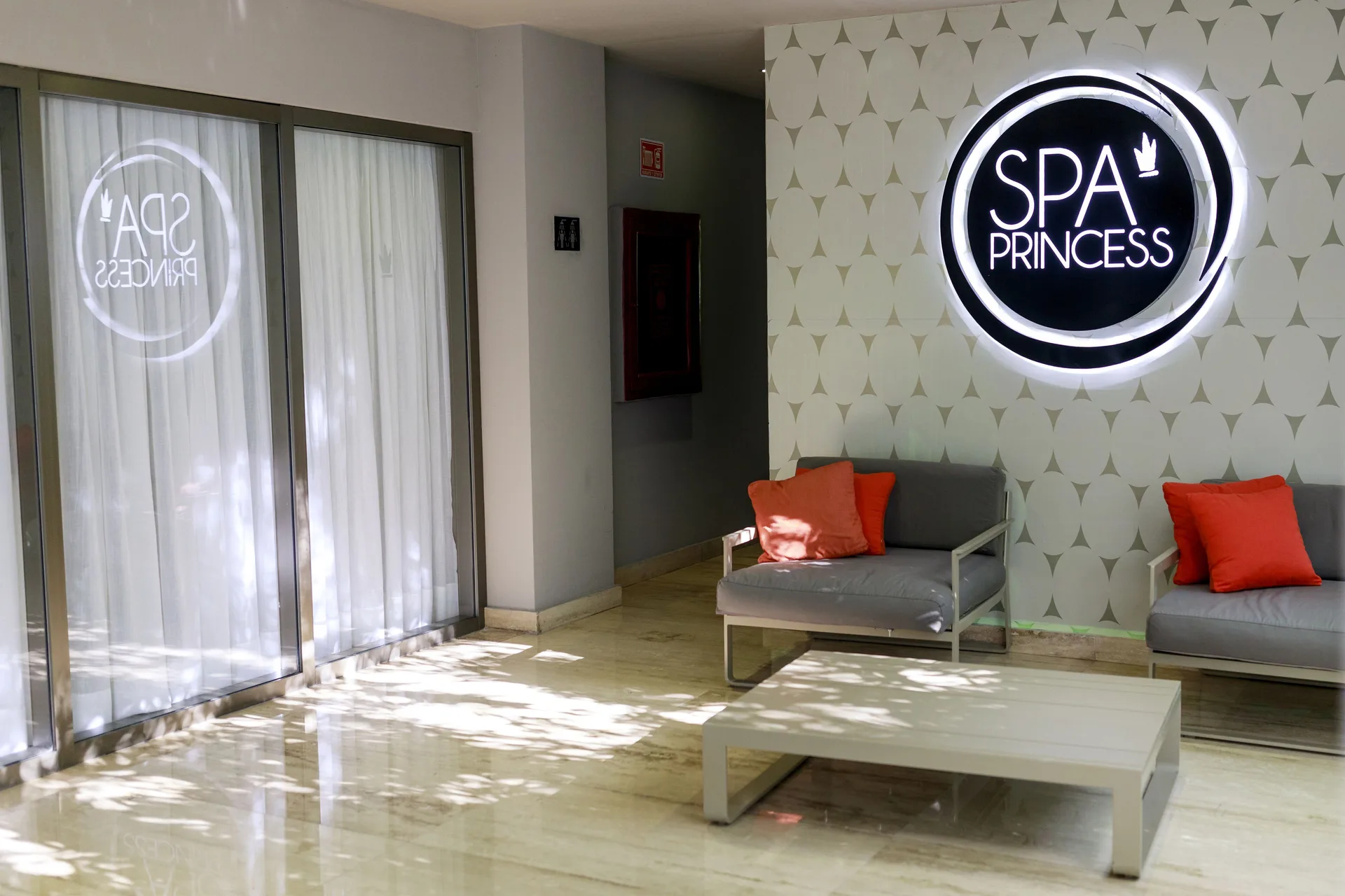 Spa Princess entrance lounge with seating at Platinum Yucatan Princess.