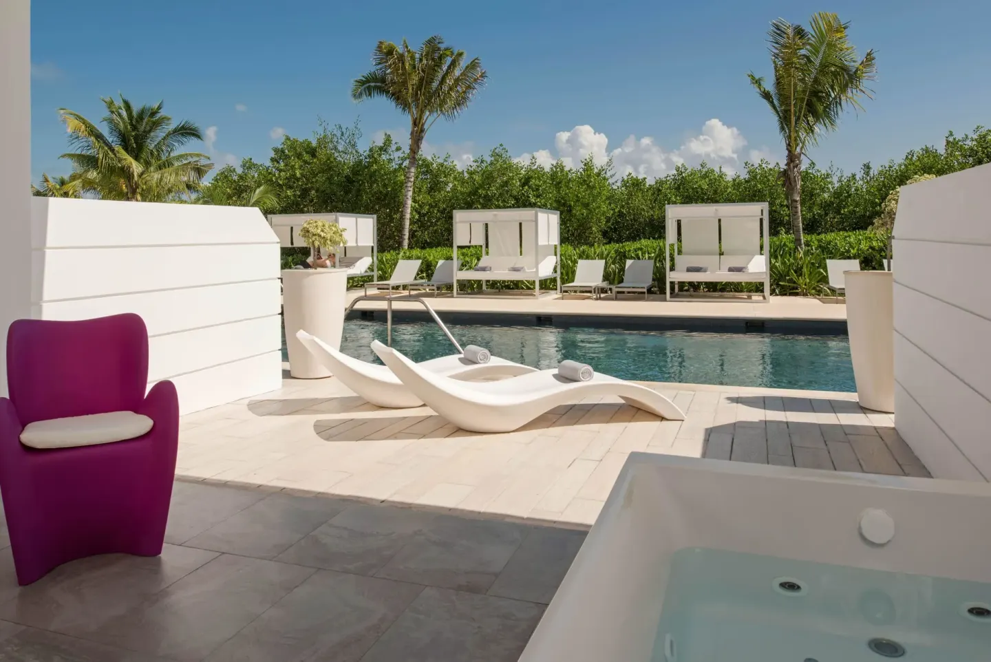 Terrace with whirlpool tub and poolside loungers at Platinum Yucatan Princess.
