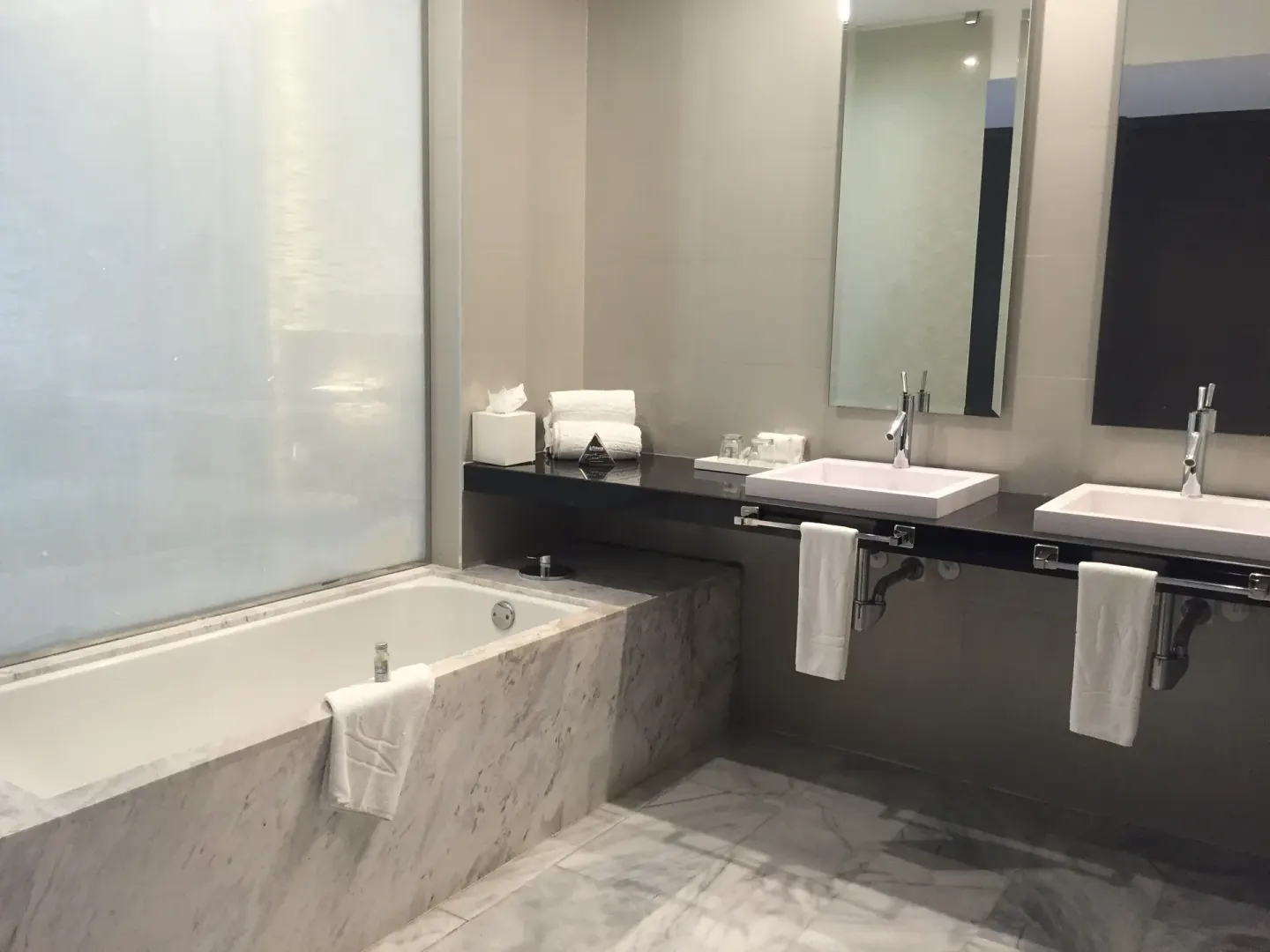 Junior Suite bathroom with bathtub and double sinks at Platinum Yucatan Princess.