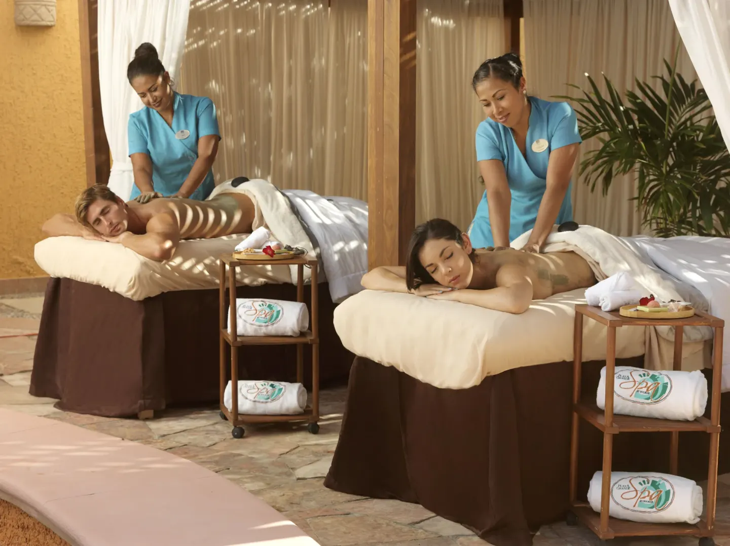Outdoor side-by-side massages at Playa Grande Resort & Grand Spa.