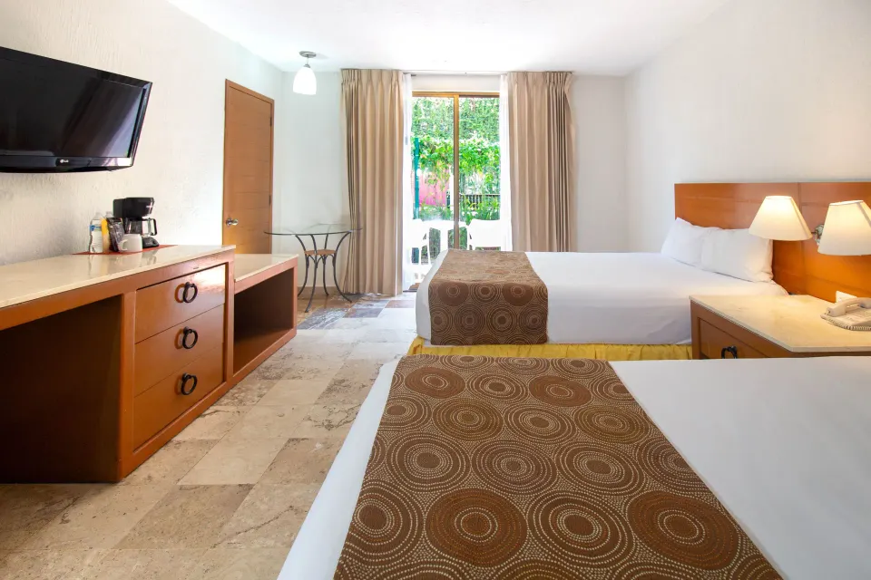 Standard Room with two beds and balcony at Plaza Pelicanos Club Beach Resort.