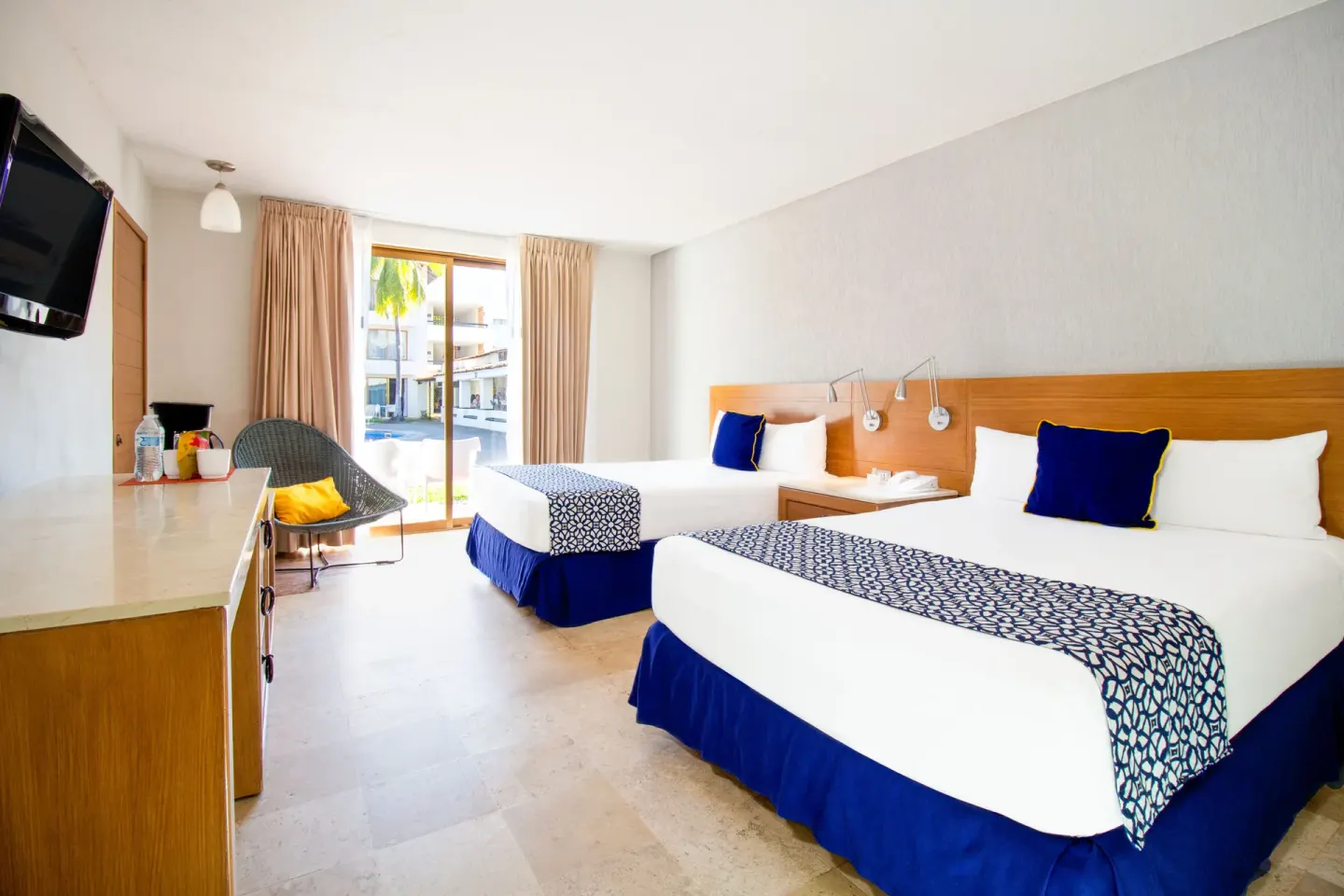 Superior Room with two beds and balcony view at Plaza Pelicanos Club Beach Resort.