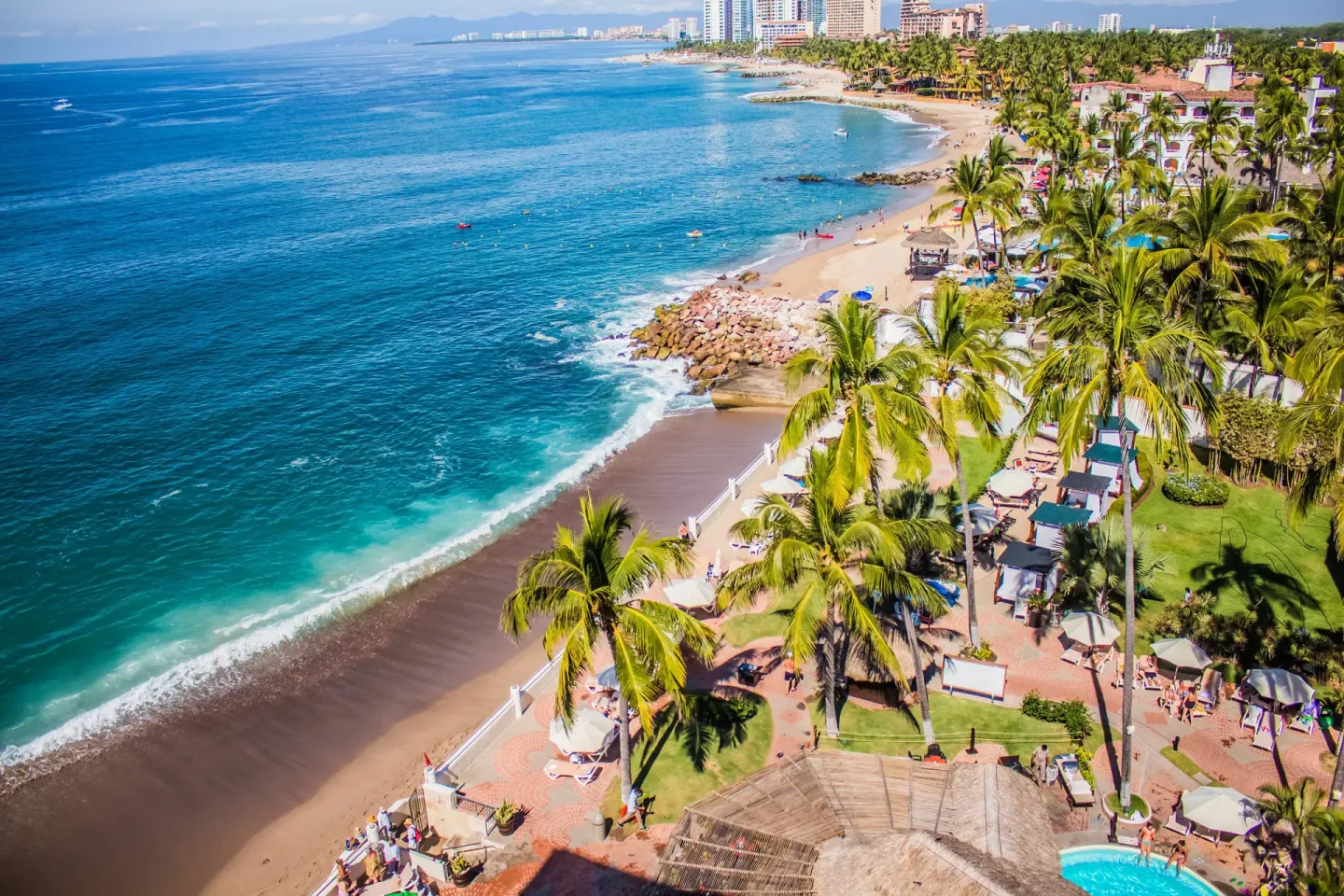 Aerial beach and ocean view beside Plaza Pelicanos Grand Beach Resort.