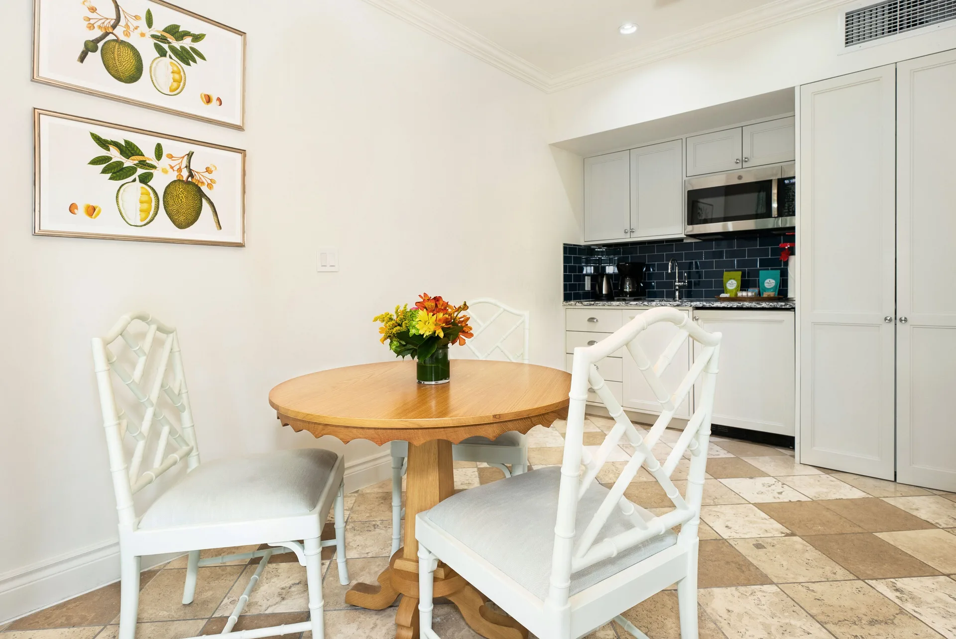 Center Atlantic Suite at Point Grace with dining area, elegant design, and Atlantic Ocean views in Turks and Caicos.