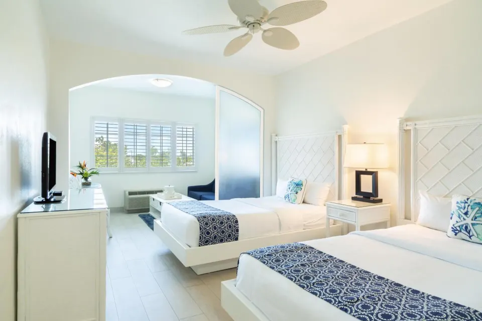 Superior Room with two beds and sitting area at Ports of Call Resort.