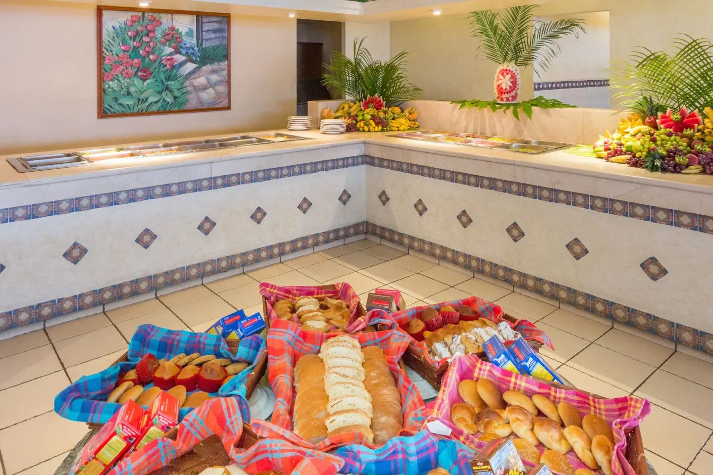 Breakfast buffet with breads, fruit and hot dishes at Posada Real Ixtapa.