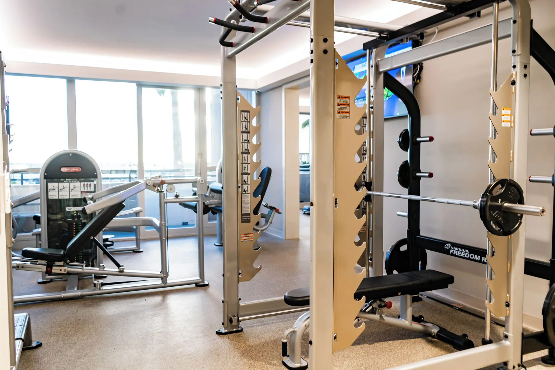 Fitness room with weight machines and strength equipment at Prince Waikiki.