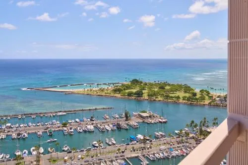 Oceanfront marina and turquoise water view from a guest room at Prince Waikiki.