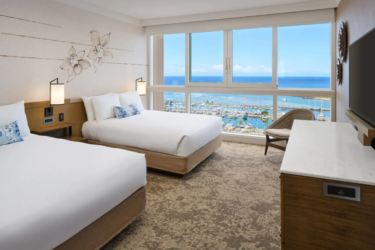Club Premier Oceanfront room with two beds and marina views at Prince Waikiki.