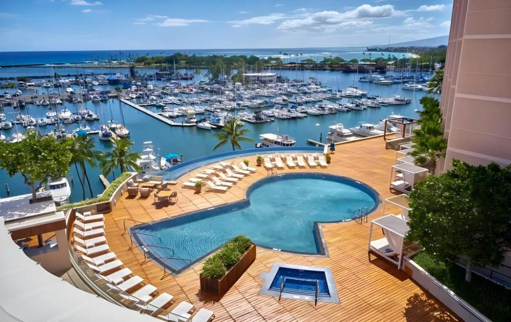 Ocean Front Harbor Two Room view of the pool, marina, and ocean at Prince Waikiki.