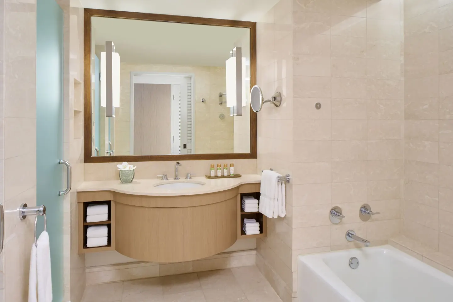 Ocean Front Harbor room bathroom with vanity and tub at Prince Waikiki.
