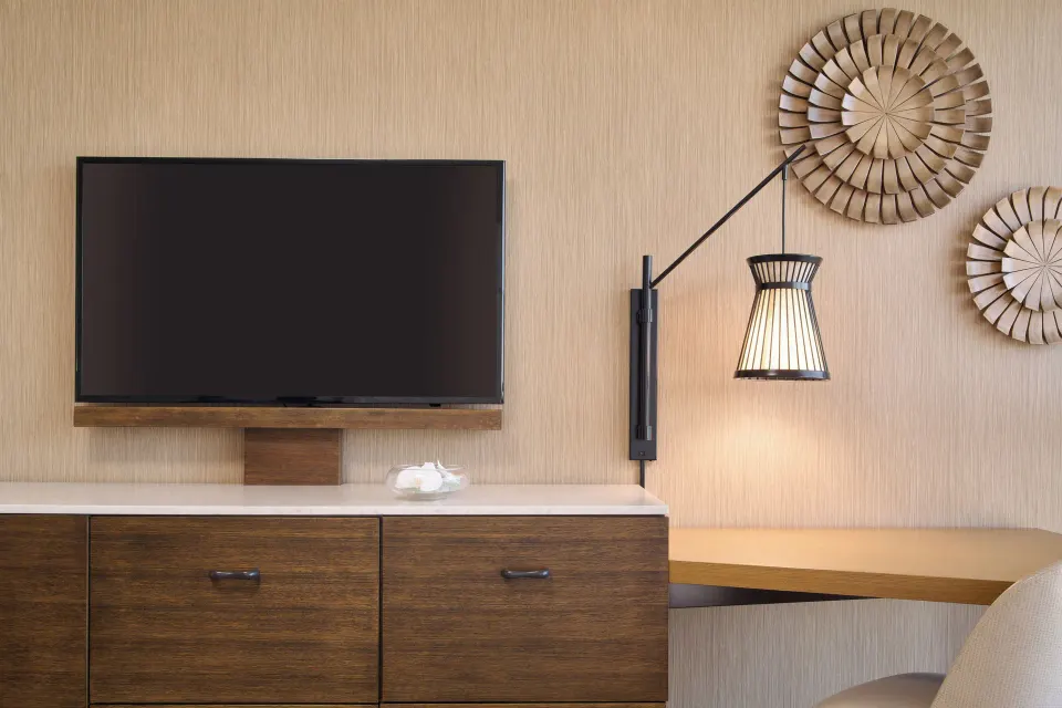 Ocean Front room TV, dresser, and desk detail at Prince Waikiki.
