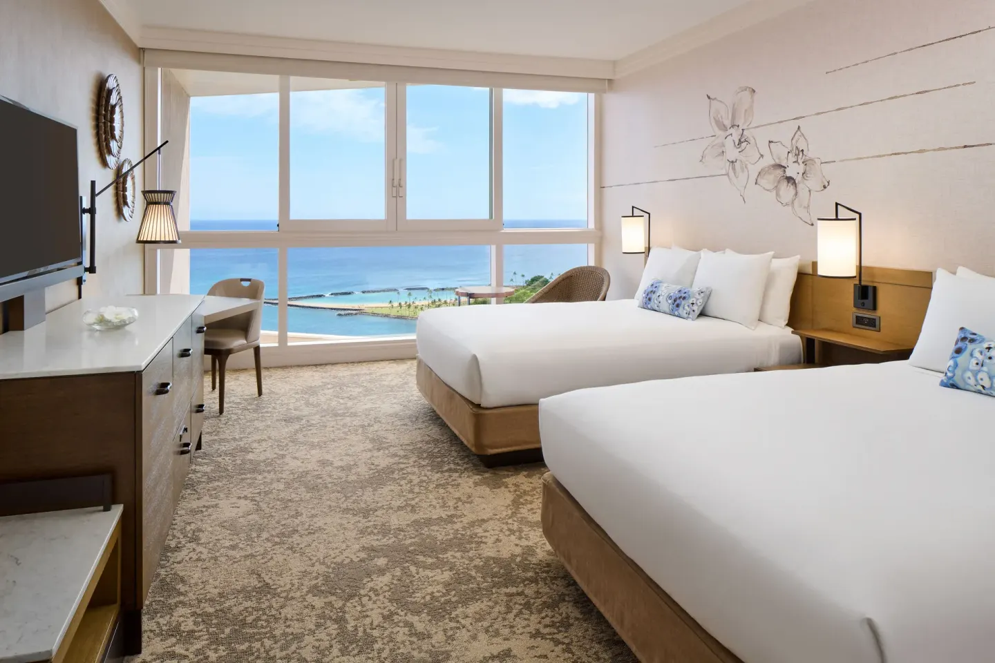 Ocean View room with two beds, desk, TV, and blue ocean view at Prince Waikiki.