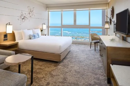Oceanfront Harbor View Room with king bed and ocean view at Prince Waikiki.